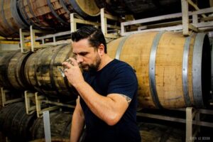 Latitude 55's Head Distiller, Nick Kebalo.